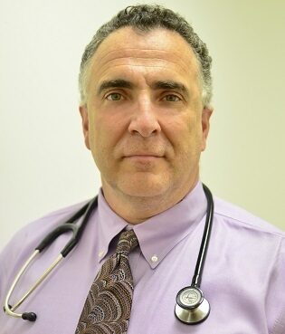 Dr. Mack Sullivan, MD — A Multi-Disciplinary Physician Bridging Emergency Medicine and Everyday Wellness In Eastchester, New York, Dr. Mack Lee Sullivan, MD, has built a career that goes well beyond the traditional boundaries of a single specialty. As an Emergency Medicine physician who also holds training in Internal Medicine and Physical Medicine & Rehabilitation, Dr. Sullivan brings a uniquely comprehensive clinical perspective to his patients — one that blends the speed and precision of emergency care with the depth of a long-term primary care relationship. Education and Training Dr. Sullivan earned his medical degree from Albert Einstein College of Medicine of Yeshiva University in 1995. He completed two concurrent residencies, both at the Montefiore Medical Center / Albert Einstein College of Medicine complex: Residency in Emergency Medicine (Jacobi/Montefiore Campus), 1996–1999 Residency in Internal Medicine (Moses and Weiler Campuses), 1995–1998 This dual-residency training is exceptionally rare and gives Dr. Sullivan a depth of diagnostic reasoning that most physicians in either specialty alone cannot match. He is currently licensed to practice medicine in New York, New Jersey, and Connecticut. Practice Location Dr. Sullivan practices at Fitness And Recovery Medical, located at: 369 White Plains Rd, Suite B, Eastchester, NY 10709 He is affiliated with NewYork-Presbyterian Westchester, White Plains Hospital, and Long Island Jewish Medical Center. Academic Contributions Dr. Sullivan is not only a practicing clinician — he has contributed to the academic literature on cardiovascular medicine and emergency toxicology. His published research includes: Atrial fibrillation and anabolic steroids — The Journal of Emergency Medicine (1999) The cardiac toxicity of anabolic steroids — Progress in Cardiovascular Diseases (1998) Reciprocal strains in the normal and ischemic myocardium and their relation to the size of the ischemic region — Journal of the American College of Cardiology (1991) This research background underscores his deep command of cardiovascular and emergency medicine principles. Clinical Specialties Dr. Sullivan sees patients across a wide spectrum of medical needs: Primary and Preventive Care: Annual physicals and wellness evaluations Allergy consultations Illness management and acute care Emergency and Urgent Care: Rapid diagnosis and treatment of acute conditions X-ray interpretation and ordering Arthritis and musculoskeletal complaints Regenerative and Integrative Medicine: Regenerative medicine procedures (including knee injections and joint therapies) Hormone Replacement Therapy (HRT) and age management Physical therapy coordination Mental Health and Behavioral Medicine: Anxiety disorders (particularly in adults and children) Obesity and overweight management Dr. Sullivan is noted for treating anxiety disorders and childhood/adolescent weight concerns more frequently than most providers in similar practices — reflecting his broader interest in the intersection of physical and mental health. Telehealth Services Dr. Sullivan offers telehealth and virtual consultations, allowing patients to access his care remotely. He can be reached through his practice at (914) 395-3691. Accepted Insurance Dr. Sullivan accepts a range of insurance plans including Aetna, Cigna, Blue Cross Blue Shield, and United Healthcare, as well as Medicare.