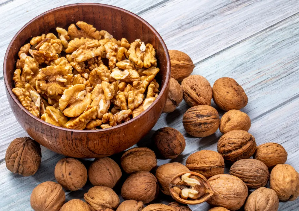 Bowl of shelled walnut halves showing walnut nutrition facts
